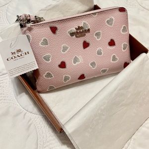 Coach Pink Corner Zip Wristlet In Heart Print